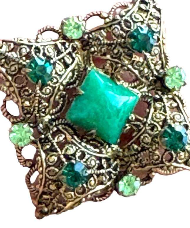 Vintage antiqued green glass crystal fancy filagree brooch