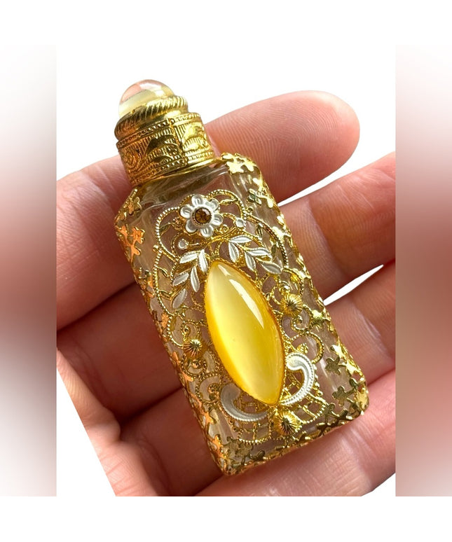 Vintage gold ornate flower decorated mini perfume bottle