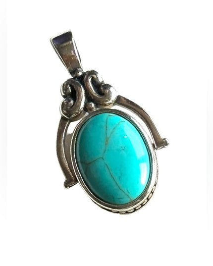 Silver finish southwestern style double side faux turquoise pendant