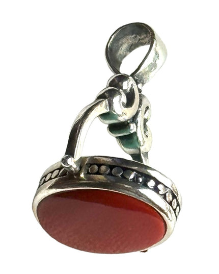 Silver finish southwestern style double side faux turquoise pendant