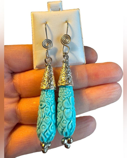 Lovely ornate Blue resin carved dangle earrings
