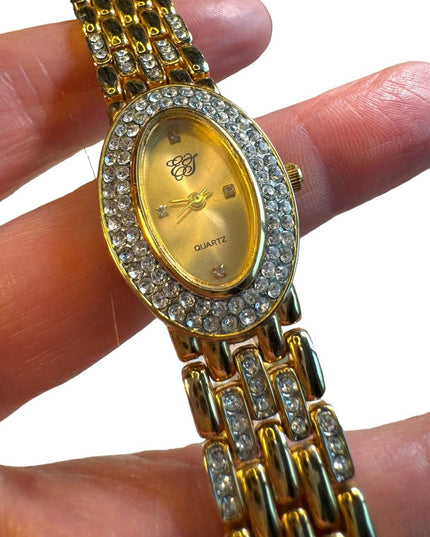 #8 Elizabeth Arden oval face gold tone watch rhinestones TICKING 7”