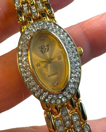 #8 Elizabeth Arden oval face gold tone watch rhinestones TICKING 7”