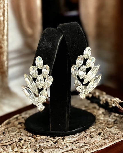 Vintage 1950s SHERMAN clear crystal leaf earrings silver finish clip ons
