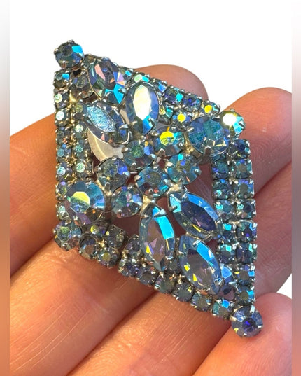 Stunnimg Jay Kel blue AB glass fancy silver finish brooch