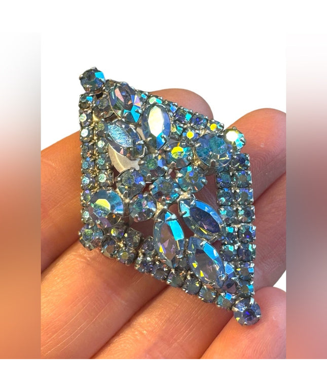 Stunnimg Jay Kel blue AB glass fancy silver finish brooch