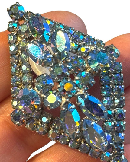 Stunnimg Jay Kel blue AB glass fancy silver finish brooch