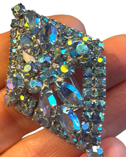 Stunnimg Jay Kel blue AB glass fancy silver finish brooch