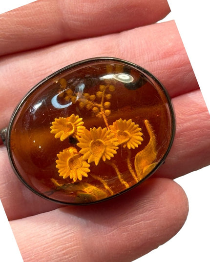Antique handmade carved flowers encased in amber  fancy silver import