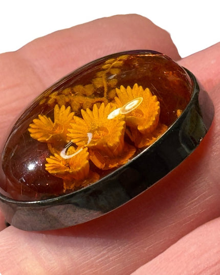 Antique handmade carved flowers encased in amber  fancy silver import