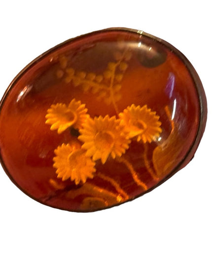 Antique handmade carved flowers encased in amber  fancy silver import
