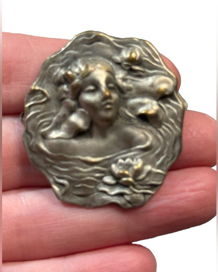 Lovely vintage metal girl with flowers high relief mold brooch