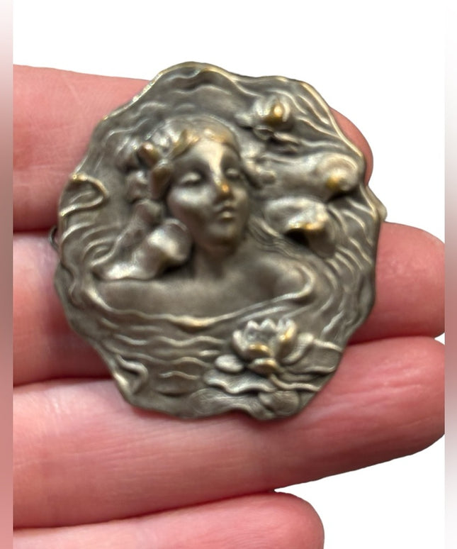 Lovely vintage metal girl with flowers high relief mold brooch
