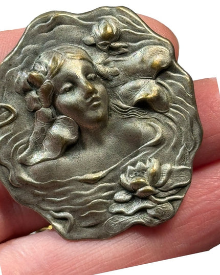 Lovely vintage metal girl with flowers high relief mold brooch