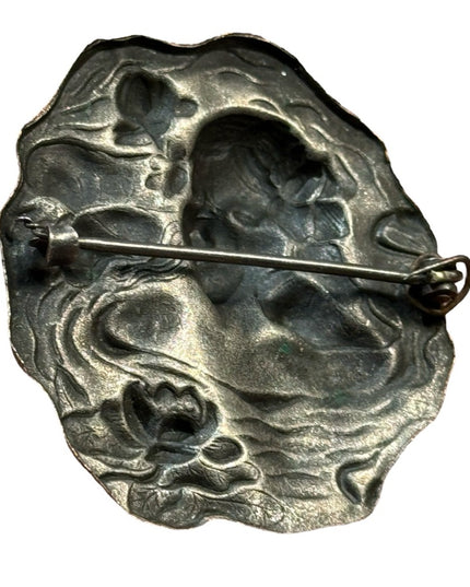 Lovely vintage metal girl with flowers high relief mold brooch