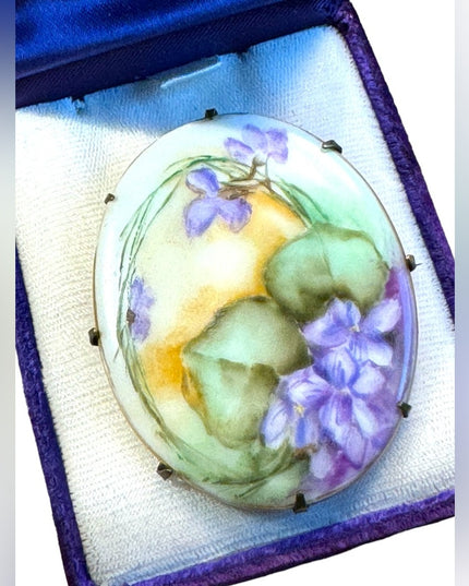 Late Victorian  early 1900's hand painted porcelain brooch  purple violets