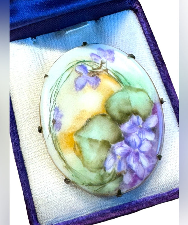 Late Victorian  early 1900's hand painted porcelain brooch  purple violets