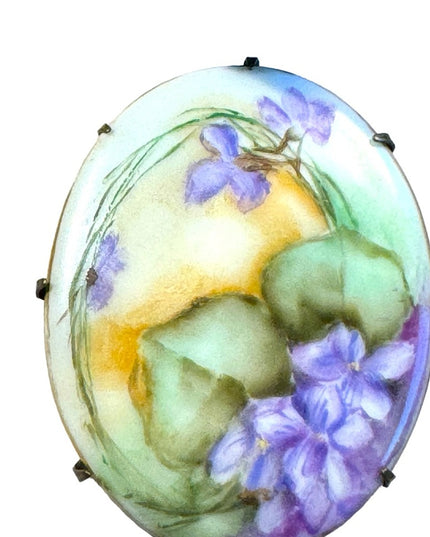Late Victorian  early 1900's hand painted porcelain brooch  purple violets