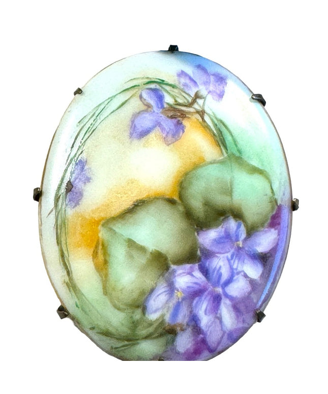 Late Victorian  early 1900's hand painted porcelain brooch  purple violets