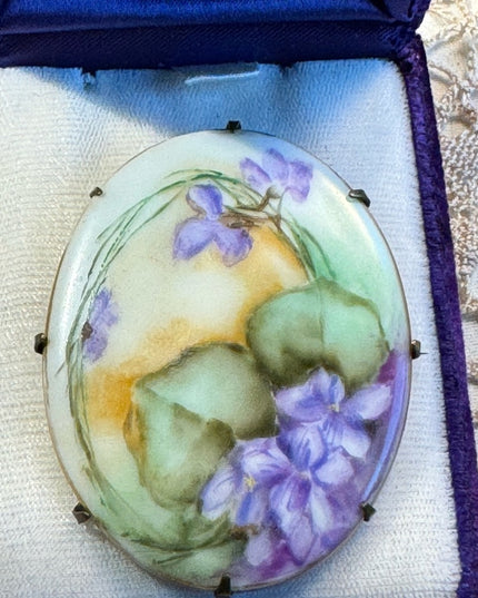 Late Victorian  early 1900's hand painted porcelain brooch  purple violets