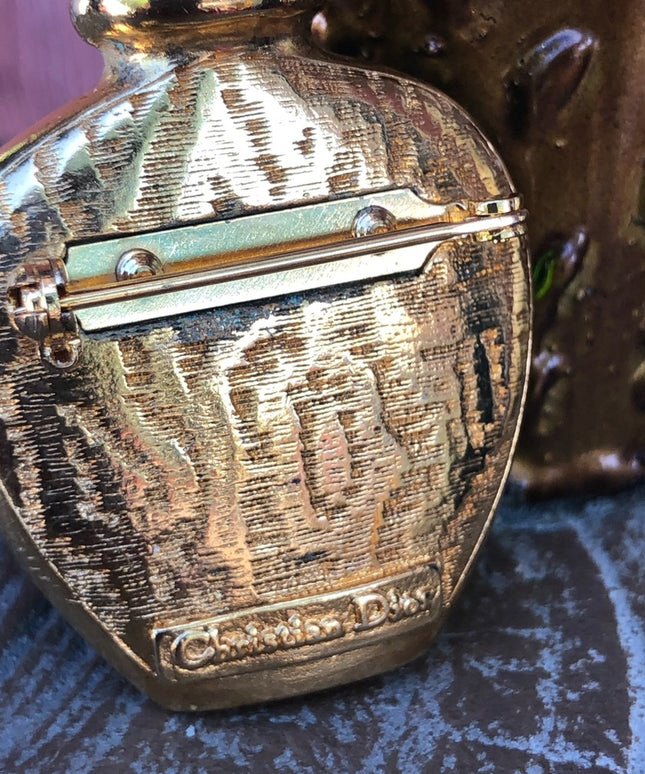 Vintage gold plated Poison Christian Dior Perfume bottle brooch