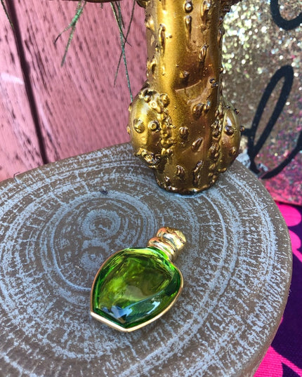 Vintage gold plated Poison Christian Dior Perfume bottle brooch