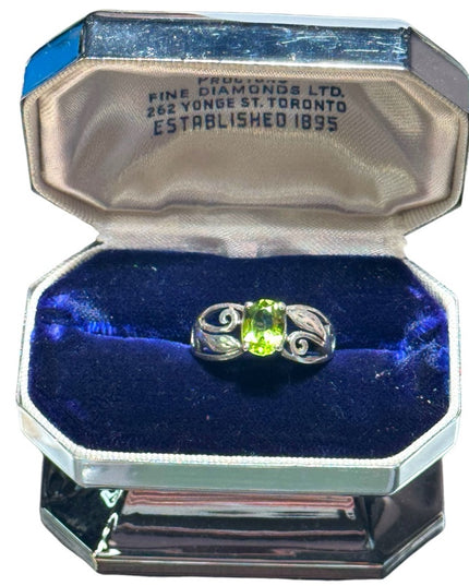 Fancy sterling silver scrollwork design peridot stone ring