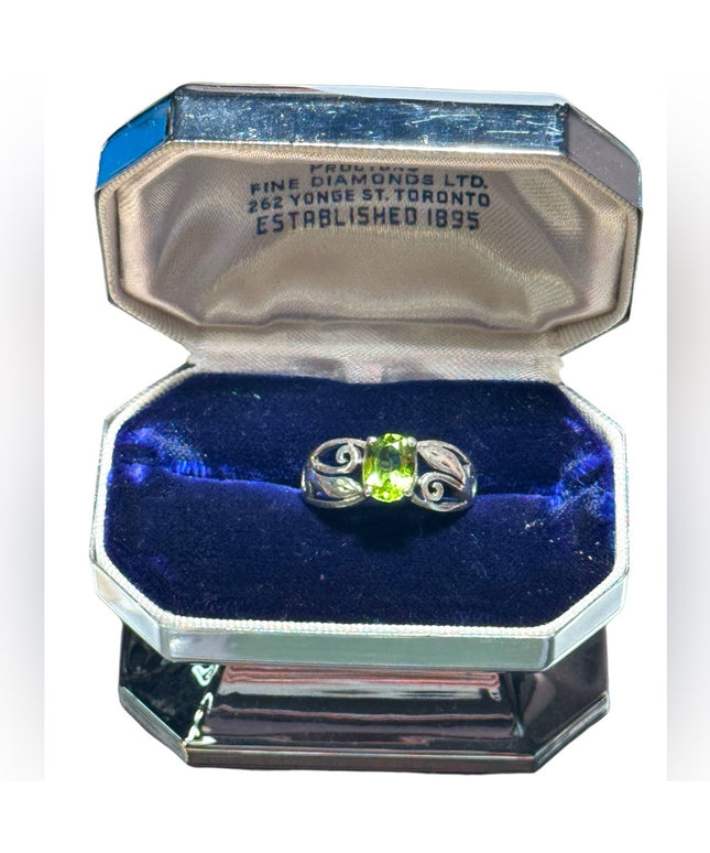 Fancy sterling silver scrollwork design peridot stone ring