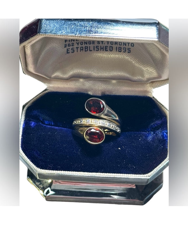 lovely sterking & gold plt Garnet with diamonds twist ring