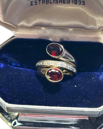 lovely sterking & gold plt Garnet with diamonds twist ring
