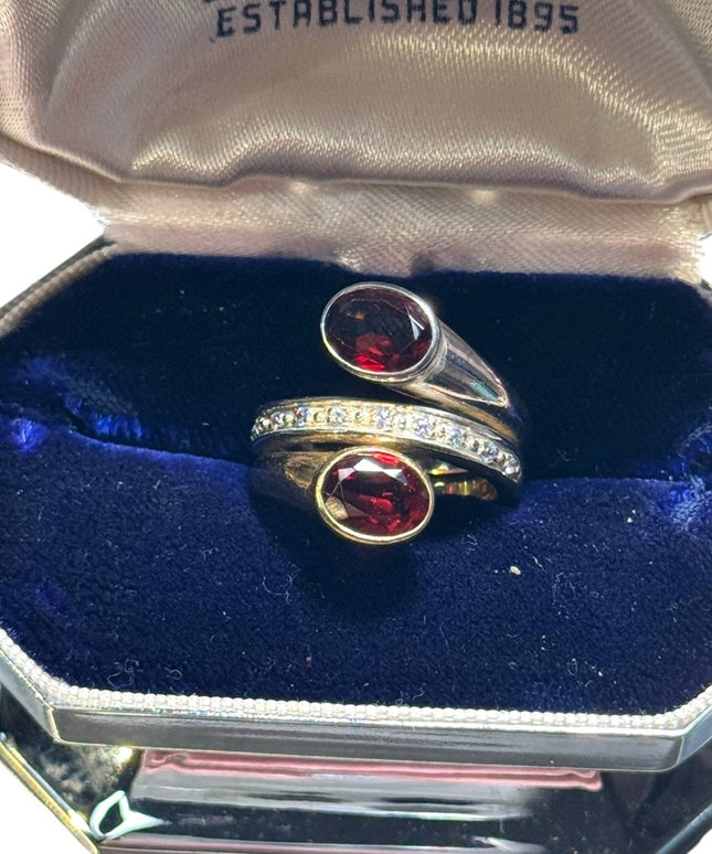 lovely sterking & gold plt Garnet with diamonds twist ring