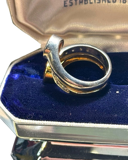 lovely sterking & gold plt Garnet with diamonds twist ring