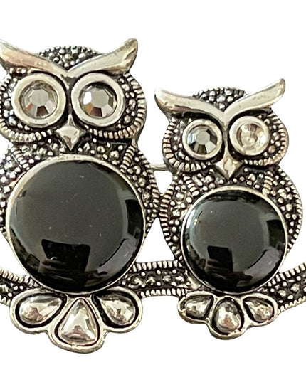 - Silver tone Marcasite 2 owls sitting on a branch brooch