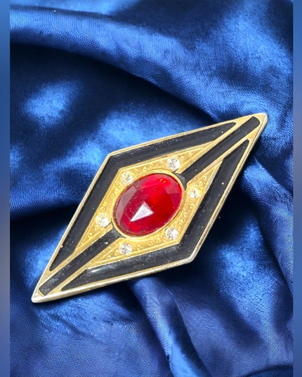 - Art Deco style gold finish black enamel ruby red crystal bar brooch