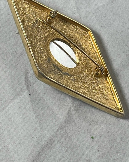 - Art Deco style gold finish black enamel ruby red crystal bar brooch