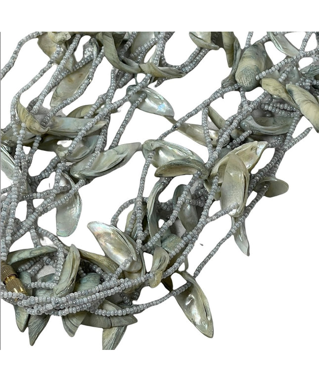 - Vintage 4 strand shell & seed bead necklace 28”