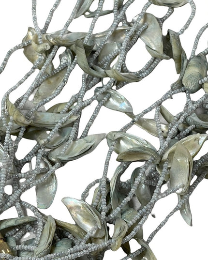 - Vintage 4 strand shell & seed bead necklace 28”