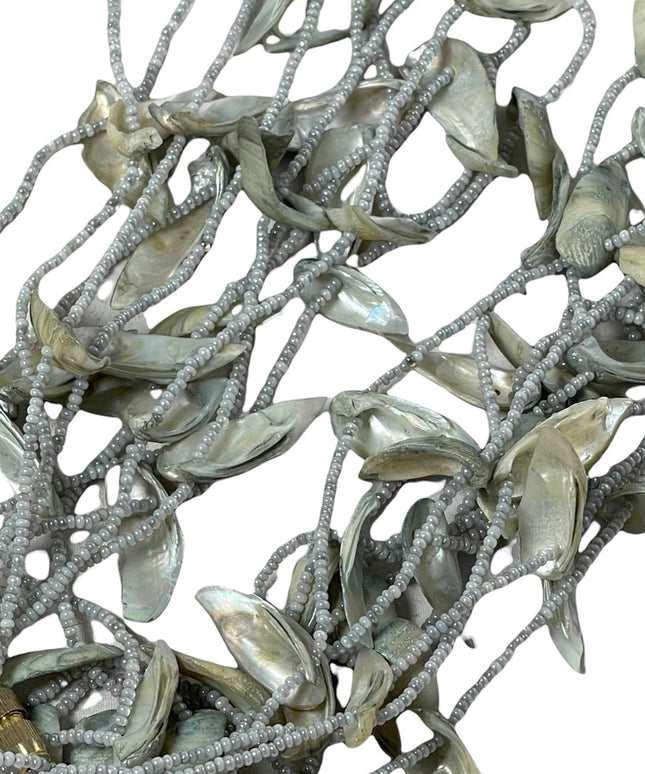 - Vintage 4 strand shell & seed bead necklace 28”