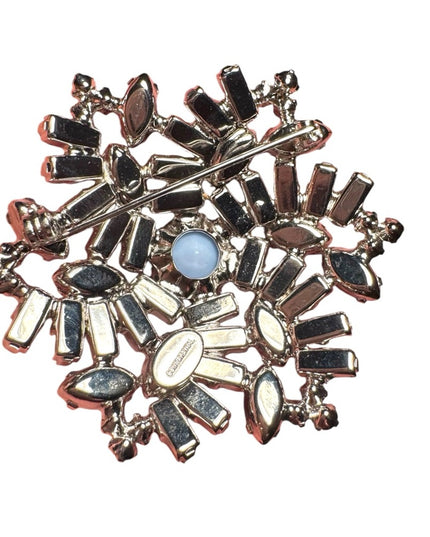 Vintagee 1960s Continental blue starburst glass silver finish brooch