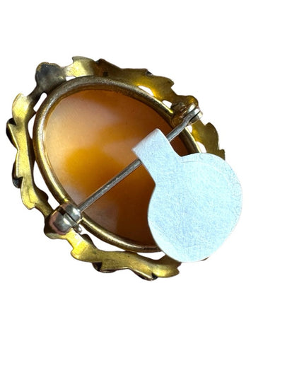 Vintage good filled shell Cameo Brooch ornate leaf bezel
