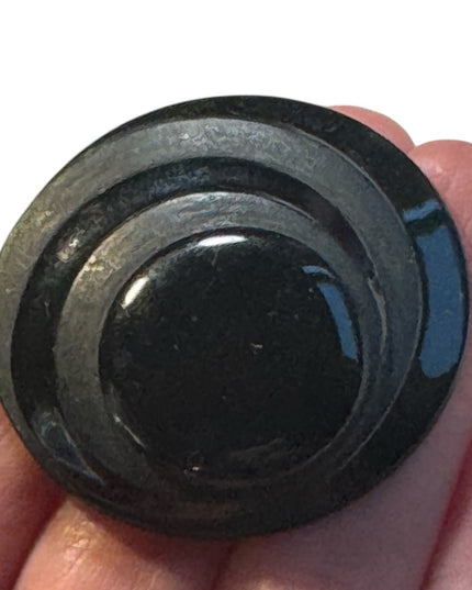 Vintage modernist swirl black enamel round brooch 1960s