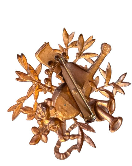 Vintage musical copper floral brooch