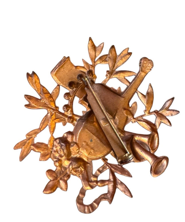 Vintage musical copper floral brooch