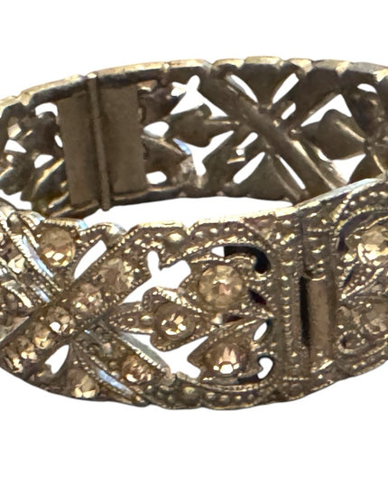Vintage silver tone Pot metal hinged bangle bracelet with clear rhinestones