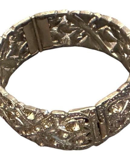Vintage silver tone Pot metal hinged bangle bracelet with clear rhinestones