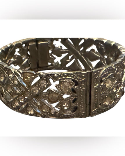 Vintage silver tone Pot metal hinged bangle bracelet with clear rhinestones