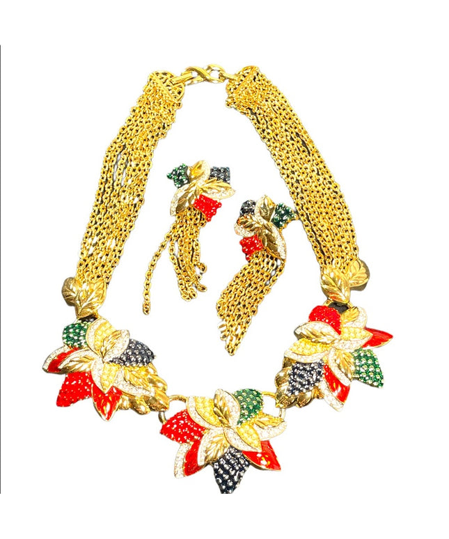 1990s RARE NINA RICCI PARIS Hawaiian Flower Gold
plated Rhinestone enamel