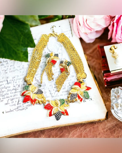 1990s RARE NINA RICCI PARIS Hawaiian Flower Gold
plated Rhinestone enamel