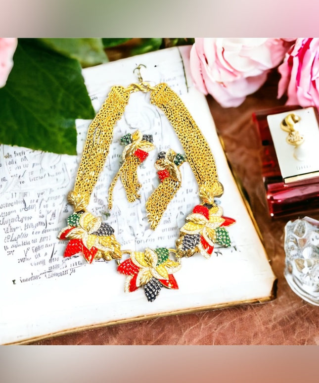 1990s RARE NINA RICCI PARIS Hawaiian Flower Gold
plated Rhinestone enamel