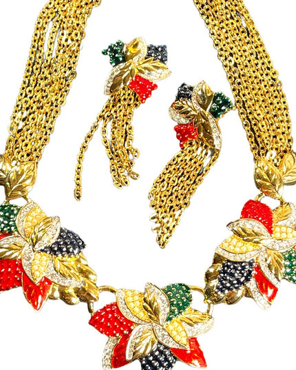 1990s RARE NINA RICCI PARIS Hawaiian Flower Gold
plated Rhinestone enamel